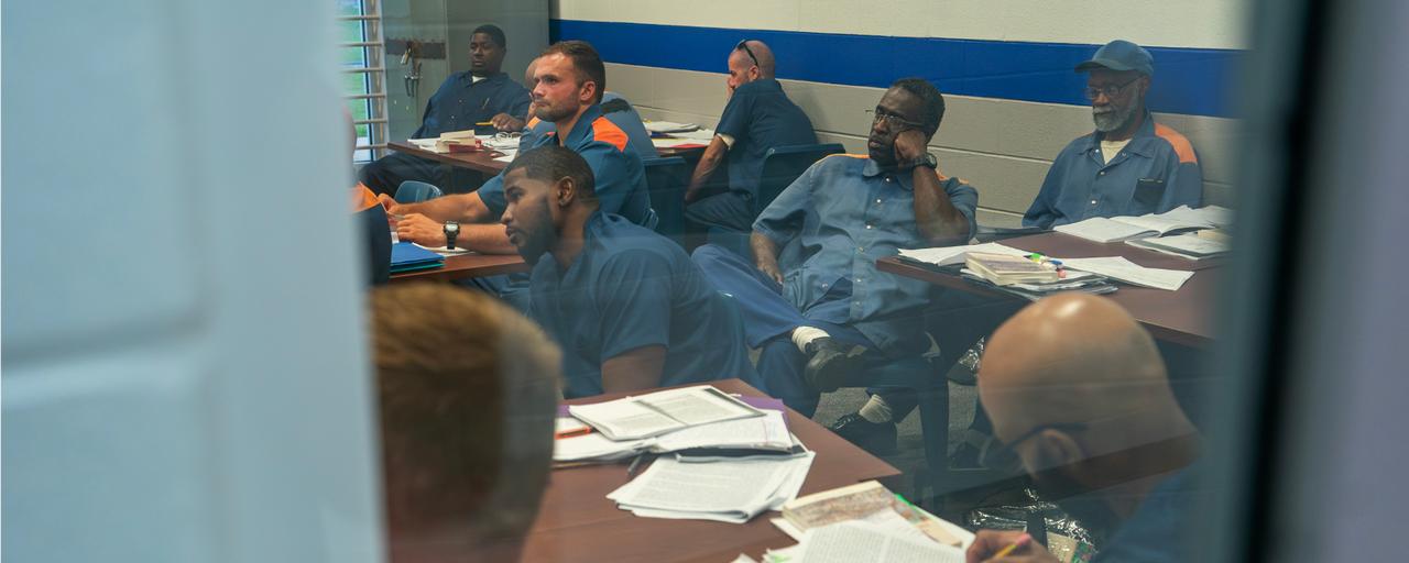 Students taking notes in the classroom during a lecture